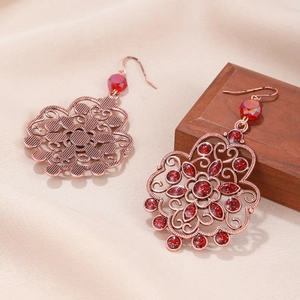 Luxurious bohemian red rhinestone dangle earrings in rose gold metal floral design