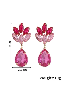 Detail view of rhinestone waterdrop earrings showing 6cm height and 2.6cm width