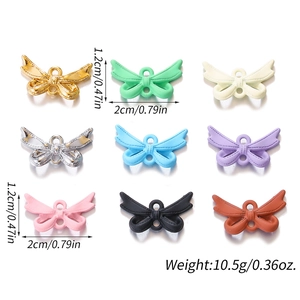 Colorful alloy bow charms set in nine metallic finishes for DIY jewelry making