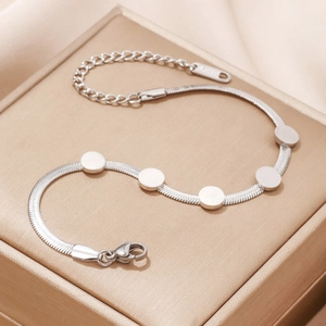 Elegant silver stainless steel flat snake chain bracelet with five polished round charms