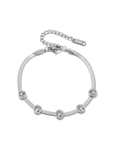 Detail of silver stainless steel snake chain bracelet with Tree of Life charms