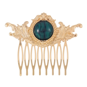 Vintage Baroque gold metal hair comb with round green stone and embossed scroll patterns