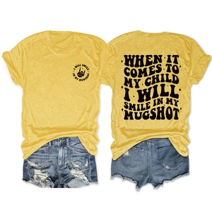 Detailed front and back view of ginger yellow t-shirt with black graphic slogan print