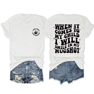 Front and back view of white cotton T-shirt with vintage slogan print and denim shorts