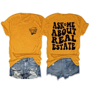 Flat lay of yellow cotton real estate t-shirt and ripped denim shorts on white background