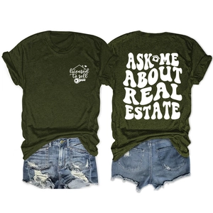 Detail of army green real estate T-shirt with licensed to sell print and denim shorts