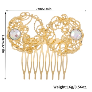 Retro golden alloy hair comb with acrylic diamonds and intricate filigree design