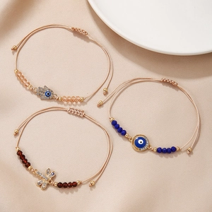 Three-piece handmade woven adjustable bracelets with Hamsa Hand and Evil Eye charms