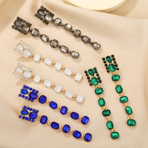 Elegant gold alloy tassel earrings with sparkling rhinestones in four vibrant colors