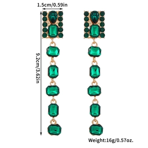 Detailed view of long green rhinestone tassel earrings with precise size dimensions