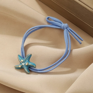 Blue ocean style starfish hair scrunchie with blue elastic band and rhinestone accents