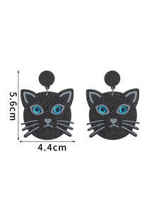 Detail view of sparkly black cat earrings with blue eyes and 5.6cm height dimensions