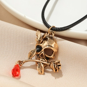 Gothic skull necklace with rose, butterfly and red crystal on black leather cord