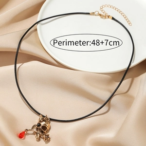 Gothic skull and rose pendant necklace with red crystal on black cord for women