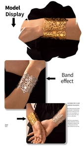 Detailed view of wide cutout floral bangle in 18k gold and silver geometric finishes