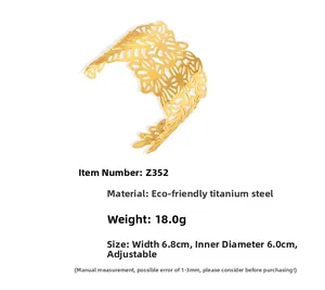 Detail of geometric open flower bracelet made of 18k gold plated stainless steel with specs