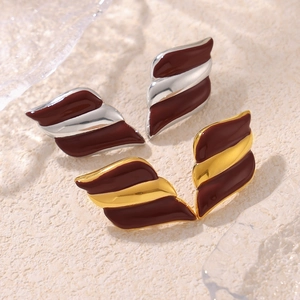 Gold and silver angel wing earrings with deep red enamel and luxury 18k gold plating