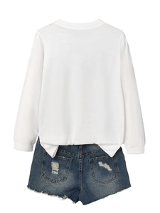 Rear view of white long sleeve sweatshirt and distressed blue denim shorts set