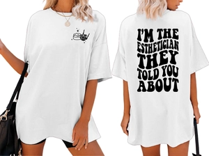 Detail of white cotton esthetician t-shirt with groovy black text on the back