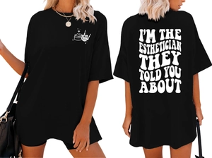 Front and back detail of oversized black Esthetician T-shirt with skull and slogan print