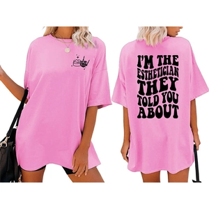 Pink oversized cotton T-shirt featuring Esthetician typography and skeleton graphic