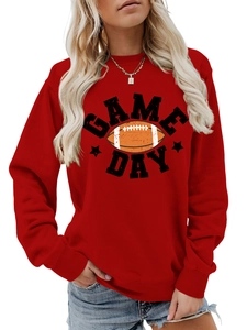 Close-up of Game Day text and football print on red long sleeve crewneck sweatshirt