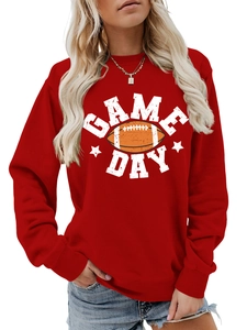 Detail of red crewneck sweatshirt with distressed Game Day football print and soft fabric