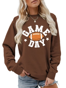 Close-up of brown Game Day sweatshirt with football graphic and white artistic font