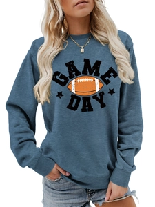 Detailed close-up of blue crewneck sweatshirt with Game Day football graphic print