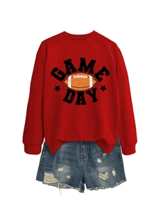 Detail of red Game Day sweatshirt featuring football print and frayed denim shorts set