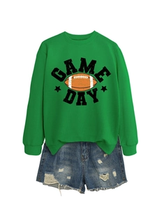 Detail of green Game Day sweatshirt with football print and distressed denim shorts