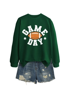 Detail of vintage Game Day print and football graphic on a green crewneck sweatshirt