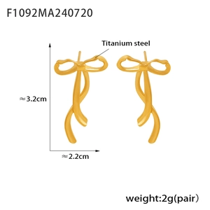 Detailed view of 18K gold plated titanium steel bow earrings measuring 3.2cm by 2.2cm