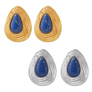 Geometric teardrop earrings in gold and silver with blue lapis lazuli stones and textures