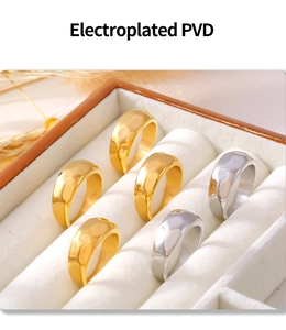 Detail of geometric hammered rings in gold and silver finish with PVD plating quality