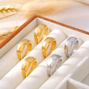 Minimalist irregular hammered wide band ring set in 18k gold and silver plated finish