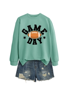 Detail view of Game Day football graphic print on a mint green crewneck sweatshirt