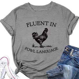 Flat lay of gray crew neck T-shirt with black rooster print and funny fowl language pun
