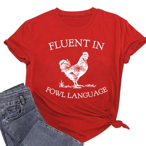 Macro shot of red cotton T-shirt featuring fluent in fowl language print and knot detail