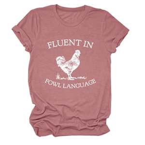 Detail of soft dusty pink t-shirt with fluent in fowl language rooster graphic print