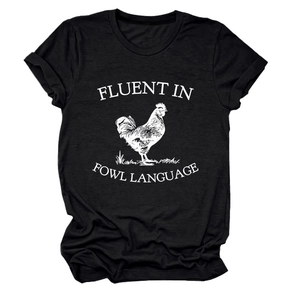 Detail of black cotton T-shirt featuring rooster print and fluent in fowl language text