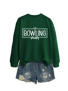 Detail of the bowling mom letter print and heart pattern on the green crewneck sweatshirt