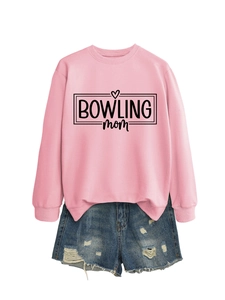 Detail of pink Bowling Mom sweatshirt with distressed denim shorts on white background