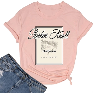 Detail of pink t-shirt with Parker Knoll print and stylish side knot on the hem