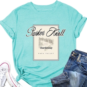 Close-up of vintage Parker Knoll Chardonnay wine label print on mint green cotton t-shirt