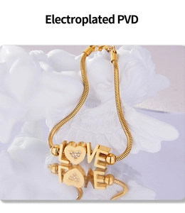 Detailed macro of gold-plated LOVE heart bracelet with sparkling zircon accents
