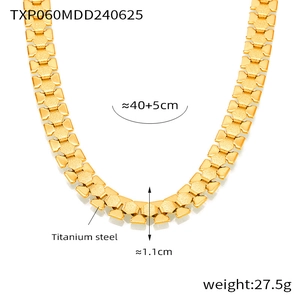 Macro shot of 18k gold plated chunky geometric chain necklace with matte finish texture