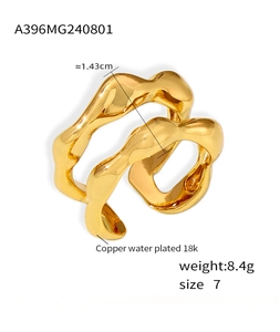 Macro detail of geometric double-layer 18k gold plated wavy ring showing 1.43cm width