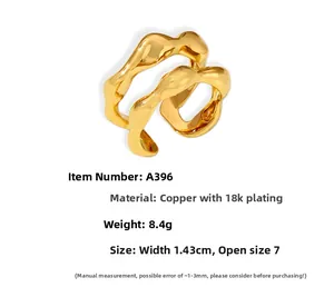 Detail of 18K gold plated double-layer open ring with irregular wave texture
