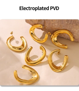 Detail of three pairs of PVD gold plated U-shaped chunky irregular C-curve hoop earrings